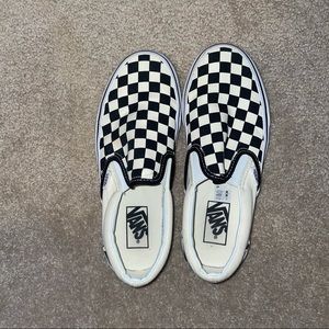 Black & white checkered slip on vans